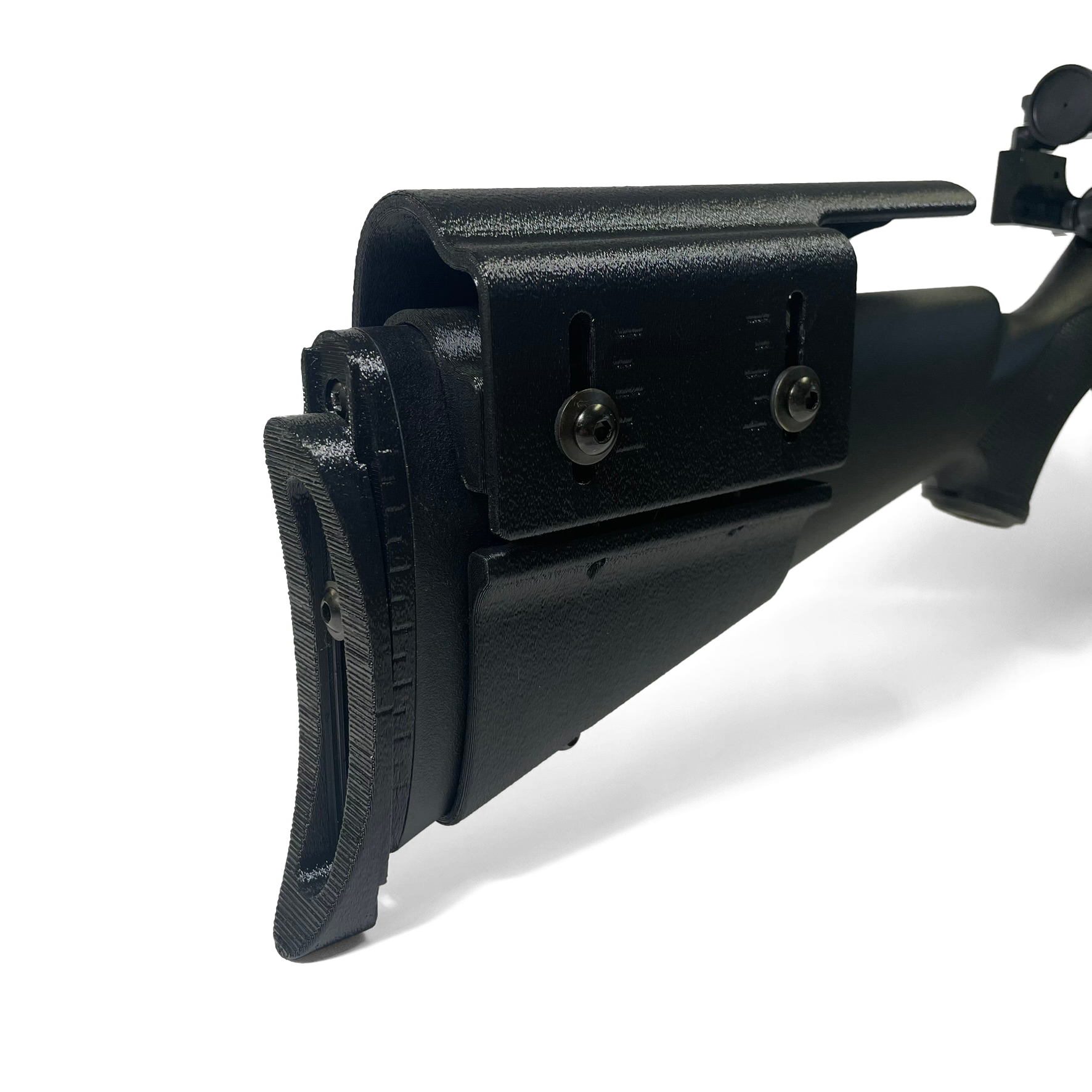 Level 2 rifle adjustment kit installed on Savage MK II composite stock showing buttplate and cheek riser