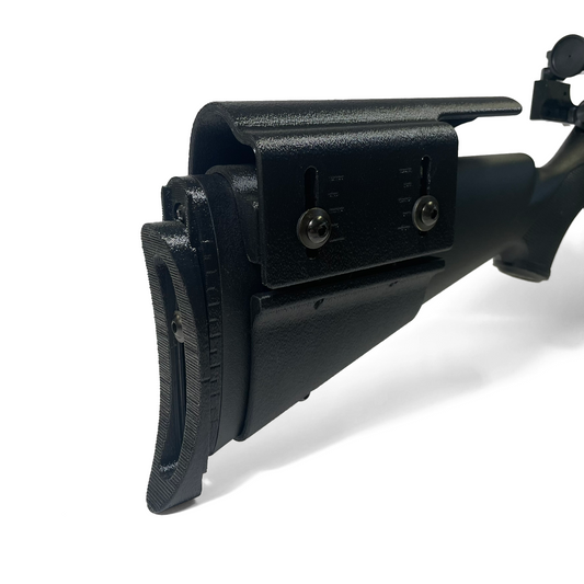 Level 2 rifle adjustment kit installed on Savage MK II composite stock showing buttplate and cheek riser